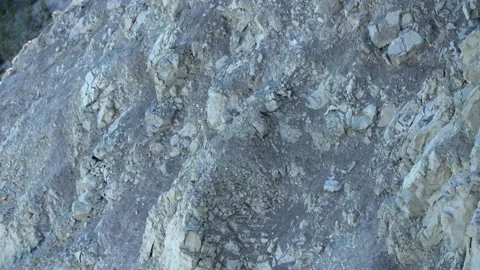 Rugged Mountain Surface During the Bright Afternoon Light Stock Footage 344877278