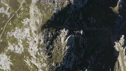 Rugged mountain terrain top down aerial background Stock Footage 141664517