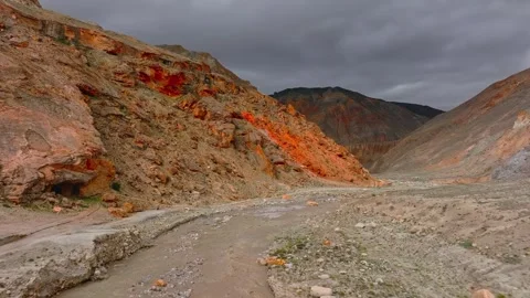 Rugged mountain valley with dramatic red rock formations Stock Footage 340076598