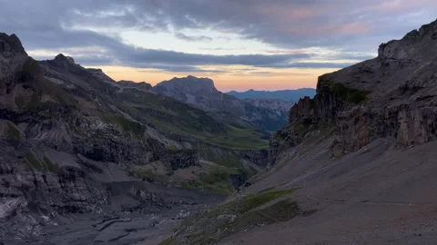 Rugged Mountain Valley Timelapse at Dawn with Clouds Stock Footage 158361558