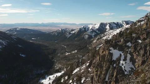 Rugged mountains and valley below Stock-Footage 166555266