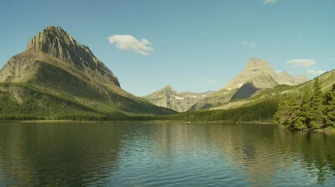 Rugged mountains with lake Stock Footage