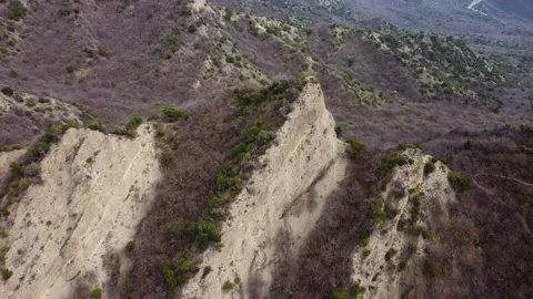Rugged mountainside aerial Stock Footage 242031449