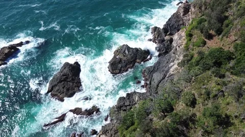 Rugged Ocean Cliffs and Turquoise Waves Stock-Footage 334904046