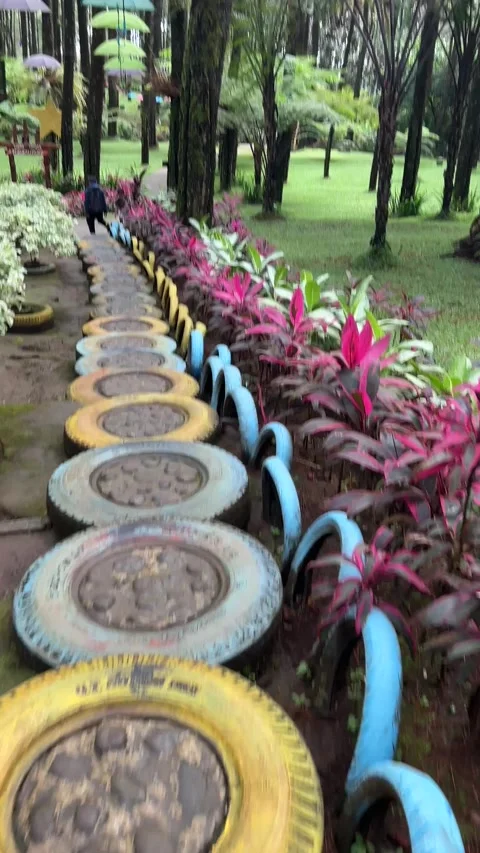 Rugged path made of tires filled with stones. Stock Footage 317533834