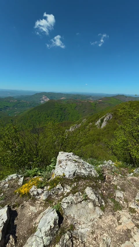 Rugged path winds through jagged rocks. Ovcar Kablar Gorge, Serbia. Vertical Видео 334223831
