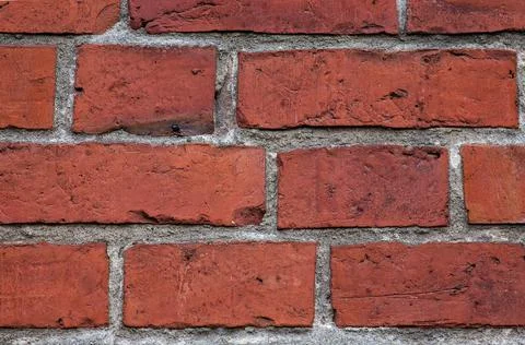 Rugged red brick wall Stock Photos