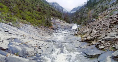 Rugged river falls along granite rock formation. Stockbeeldmateriaal 116731322