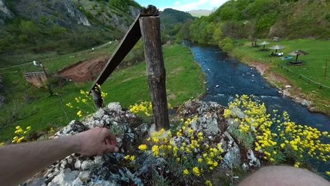 Rugged river flows through green hills. Balkan, Eastern Europe, POV Video stock 333590401