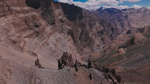 Rugged Rock Formations in Dry Mountain Range Stock Footage 311351465
