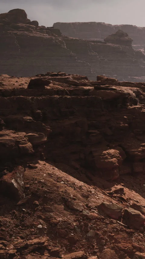Rugged rocks and shadows on a mountain landscape at sunset Stock Footage 339044241
