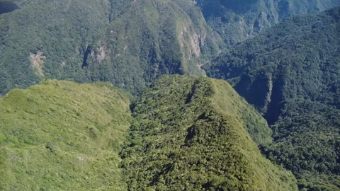 Rugged terrain and deep valley in mountains of Madeira, Portugal. Pico do Pico Stock Footage 282556827
