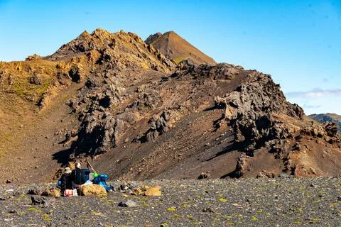 Rugged volcanic rock formations in remote mountain landscape Stock Photos