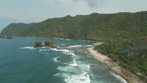 Rugged Wild South Coast Of Java Indonesia Pantai Papuma Jember Drone Track Left Stock-Footage 345035413