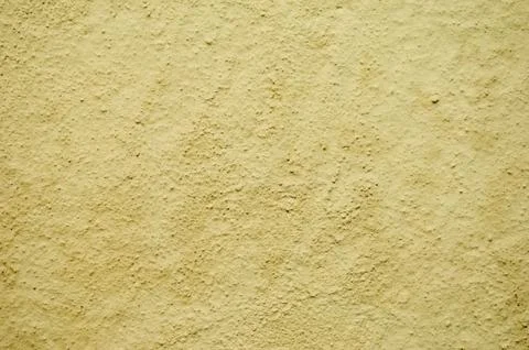 Rugged yellow wall Stock Photos