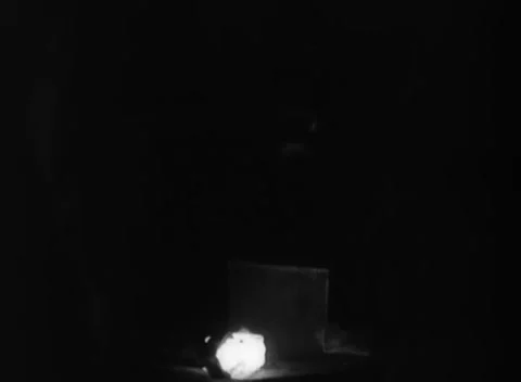 RUHR, GERMANY - 1948: Round sample - White-hot test billet glows beside a block Stock Footage 344494618