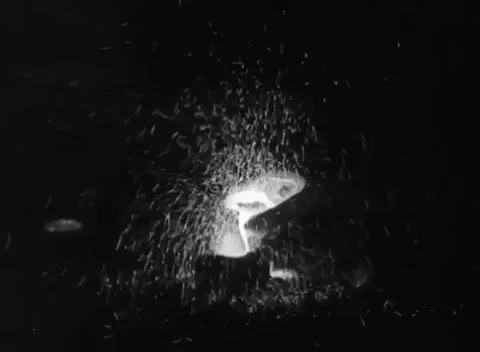 RUHR, GERMANY - 1948: Sample mould - Bright steel stream splashes into a mould Stock Footage 344494634