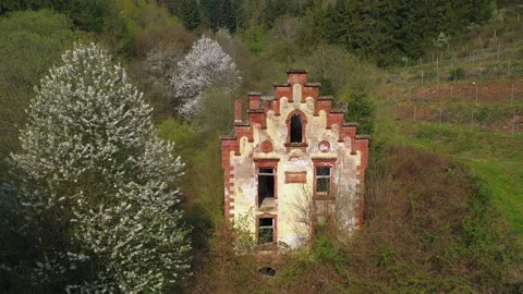 Ruined building in spring landscape Stock Footage 133550442