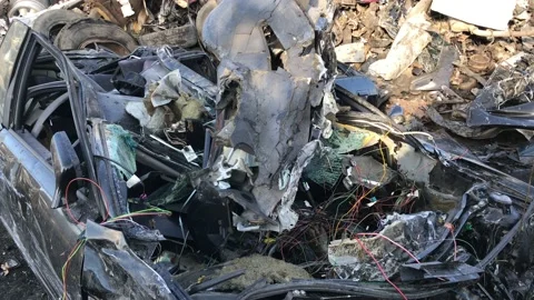 Ruined Car Close Up from Massive Wreck Stock Footage 101198150