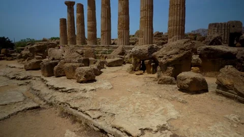 Ruined Doric columns of the Temple of Heracles rising from scattered sandst.. Stock Footage 335247580