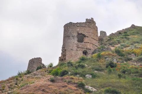 Ruined fortress in the mountains. Stock Photos