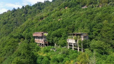 Ruined lost overgrown mining ghost town Akarmara, consequences of war in Video stock 149727212