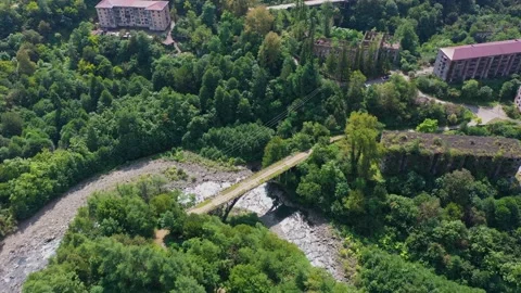 Ruined lost overgrown mining ghost town Akarmara, consequences of war in Stock Footage 152970542