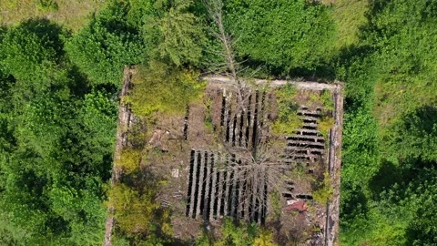 Ruined lost overgrown mining ghost town Akarmara, consequences of war in Stock Footage 154458891
