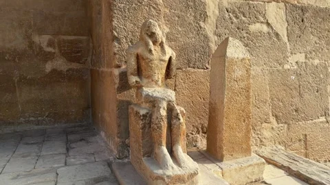 Ruined Pharaoh Khafre Statue in Stone Niche at the Entrance of Khafre Mortuary Stock Footage 341838234