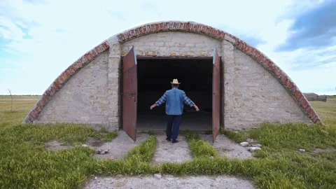 A ruined ranch without cows, pigs, sheep, animals. Empty stable, storage. Stock Footage 151535915