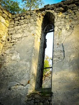 The Ruins Of An Ancient Gothic Church Whose Walls Have Already Been Crumbled Stock Photos