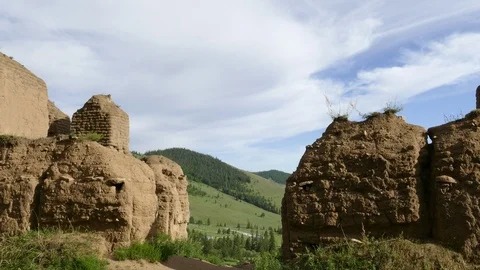 Ruins of an ancient monastery on the background of blue cloudy sky. Video stock 89674920