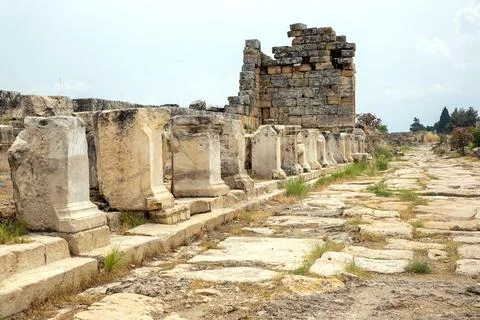 Ruins of ancient structures along a pathway in Turkey Stock Photos