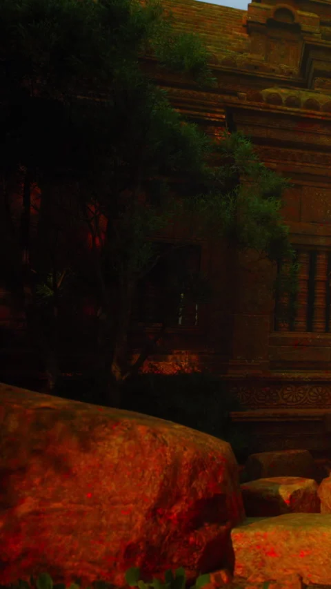 Ruins of ancient temple surrounded by rocks and trees in evening light Stock Footage 337891857