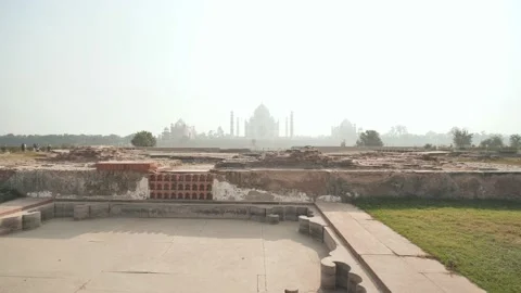 Ruins of ancient temples on the background of the Taj Mahal Stock Footage 104976756