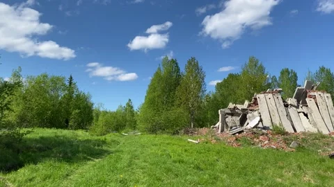 Ruins and tree-lined roads in an abandoned city. 4K shooting. Stock Footage 132387893