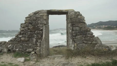 Ruins of antique construction and beach at background. Gray day Video stock 100034255