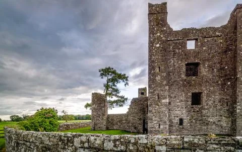 Ruins of Bective Abbey with dramatic sky at sunset. Ireland Stock Photos