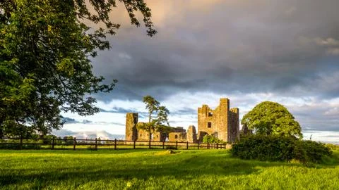 Ruins of Bective Abbey with dramatic sky at sunset. Ireland Stock Photos