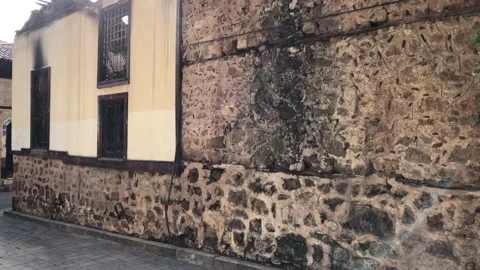 Ruins of burned ancient historical 2 floors house after fire disaster acciden Stock Footage 130284917