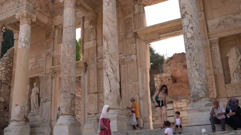 Ruins of Celsius Library in ancient city Ephesus with tourists. Stock Footage 164196010