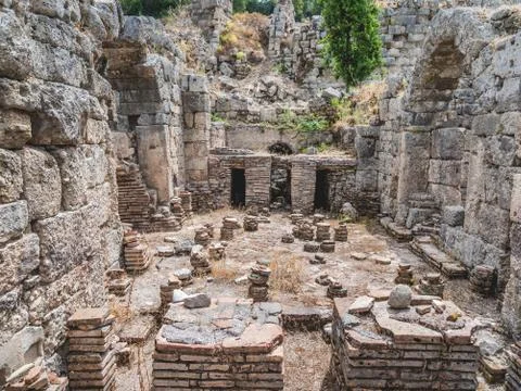 Ruins of large bath in ancient Phaselis city. Famous architectural landmark,  Stock Photos