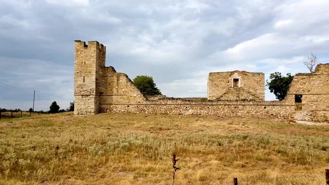 Ruins of a medieval building in the countryside, sky with clouds, Greece Stock-Footage 117761553