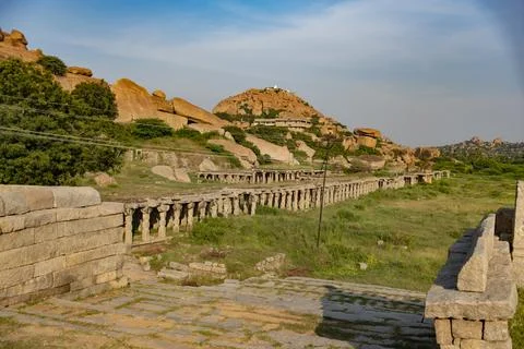 Ruins of old bazaar in front of Krishna Temple in Hampi. Stock Photos