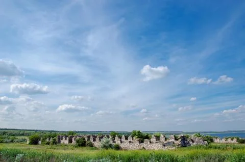 Ruins of an old building under a cloudy sky Stock Photos
