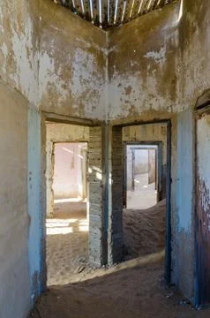 Ruins of once prosperous German mining town Kolmanskop in the Namib desert near Stock Photos