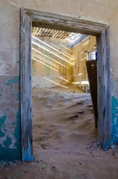Ruins of once prosperous German mining town Kolmanskop in the Namib desert near Stock Photos