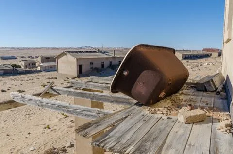 Ruins of once prosperous German mining town Kolmanskop in the Namib desert near Stock Photos