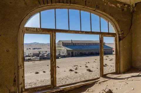 Ruins of once prosperous German mining town Kolmanskop in the Namib desert near Stock Photos