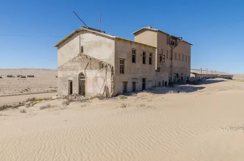 Ruins of once prosperous German mining town Kolmanskop in the Namib desert near Stock Photos